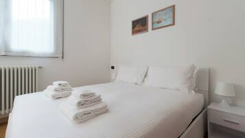 Departamento (1 Bedroom) | 1 habitación, tabla de planchar con plancha, cunas y ropa de cama