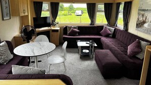 Cabin | Living area | Fireplace - Whitehouse Farm Fishery (Lincoln)