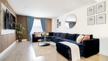 Luxury Duplex, 4 Bedrooms, Air conditioning | Living area | 70-inch LED TV with digital channels, Netflix, Hulu