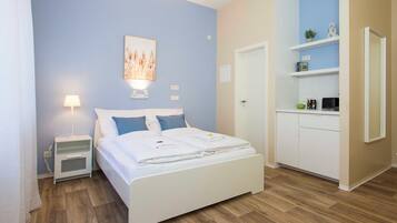 Kamar Double Klasik, Bebas Asap Rokok | Meja kerja, setrika/meja setrika, dan Wi-Fi gratis