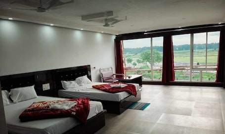 Deluxe Quadruple Room, Smoking, Lake View | Blackout drapes, iron/ironing board