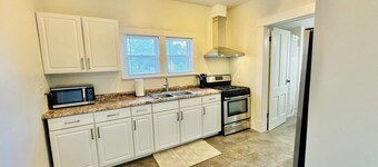 This apartment sits across the street from the school