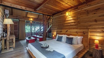 Deluxe Cottage, 1 Queen Bed, Balcony, Mountain View | 1 bedroom, blackout drapes, iron/ironing board