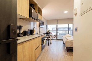 Microwave, oven, coffee/tea maker, cookware/dishes/utensils