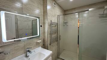 Hair dryer, towels, soap, toilet paper