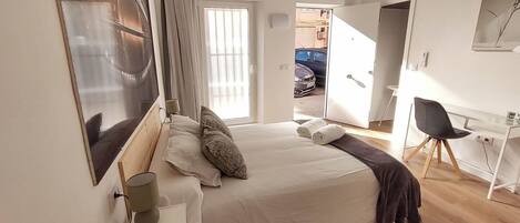 1 slaapkamer, een strijkplank/strijkijzer, wifi, beddengoed