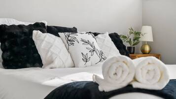 4 bedrooms, desk, iron/ironing board, travel crib