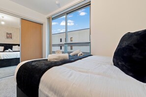 Apartamento | 2 quartos, Wi-Fi de cortesia, roupa de cama