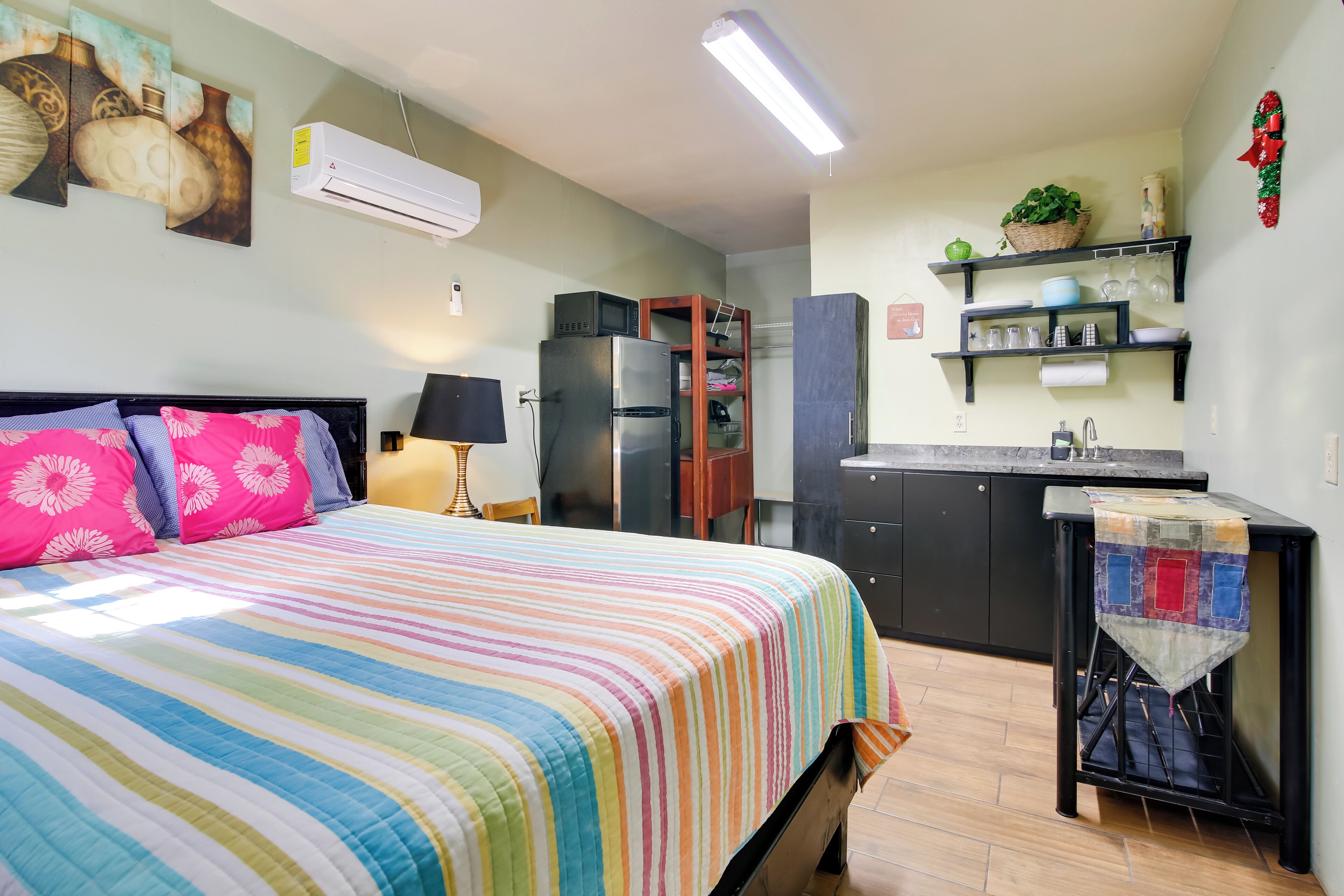 Laptop workspace, bed sheets