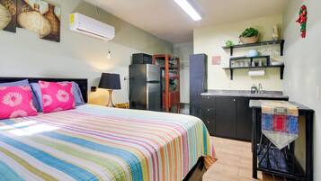 Laptop workspace, bed sheets