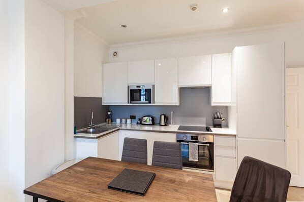 Apartment | Private kitchen | Fridge, microwave, oven, stovetop