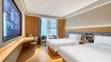 Select Comfort beds, desk, laptop workspace, blackout drapes