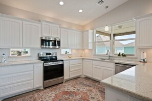 Fridge, microwave, dishwasher, coffee/tea maker