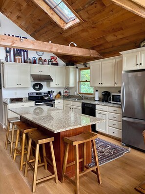 Fridge, microwave, oven, stovetop - Lovely waterfront home on Panther Pond with private tennis/pickleball court! (Raymond)