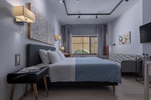2 habitaciones, caja de seguridad en la habitación y escritorio