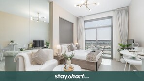 TV - StayShort - Captivating and cozy studio in Laya Heights (Dubai Studio City)