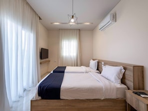 2 bedrooms, desk, iron/ironing board, WiFi - Boho 2BR Apt with Private Garden by Travelholic (90st , New Cairo)