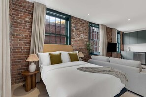 1 bedroom, desk, iron/ironing board, travel cot