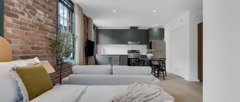 1 bedroom, desk, iron/ironing board, travel crib