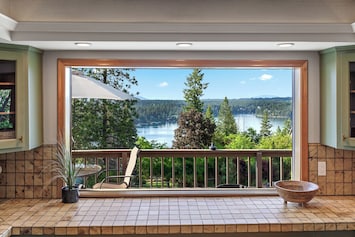 Kitchen View - Soak in the gorgeous lake views from the kitchen