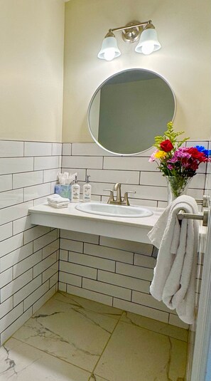 Shower, towels, soap, shampoo