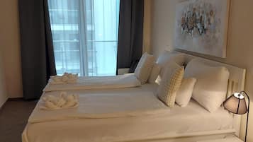 Apartamento grand | Wi-Fi de cortesia, roupa de cama
