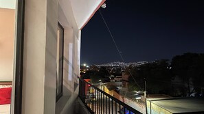 Comfort Suite, Balcony, City View | 1 bedroom, in-room safe, blackout drapes, free WiFi