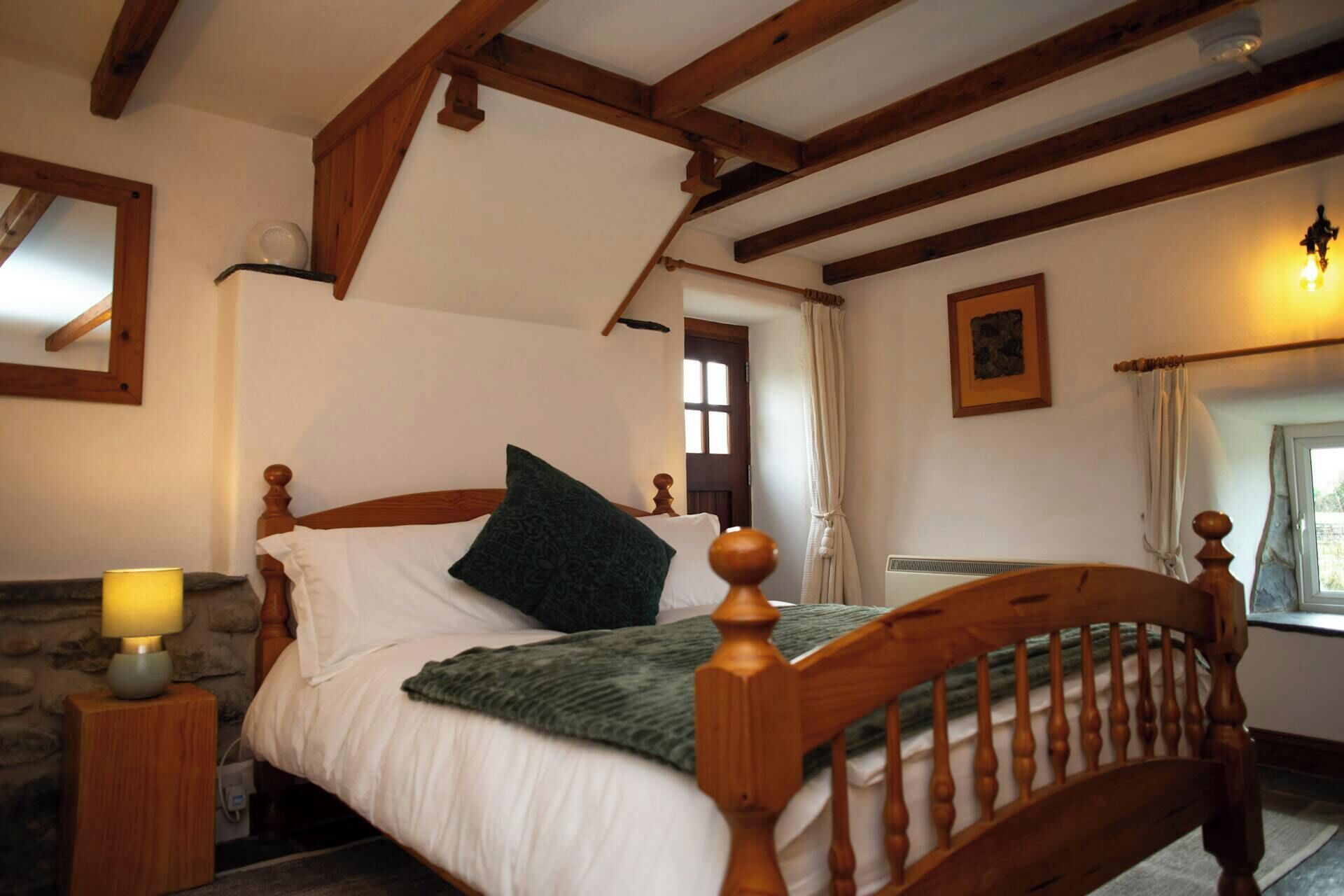 Double bedroom with bedside table and lamp