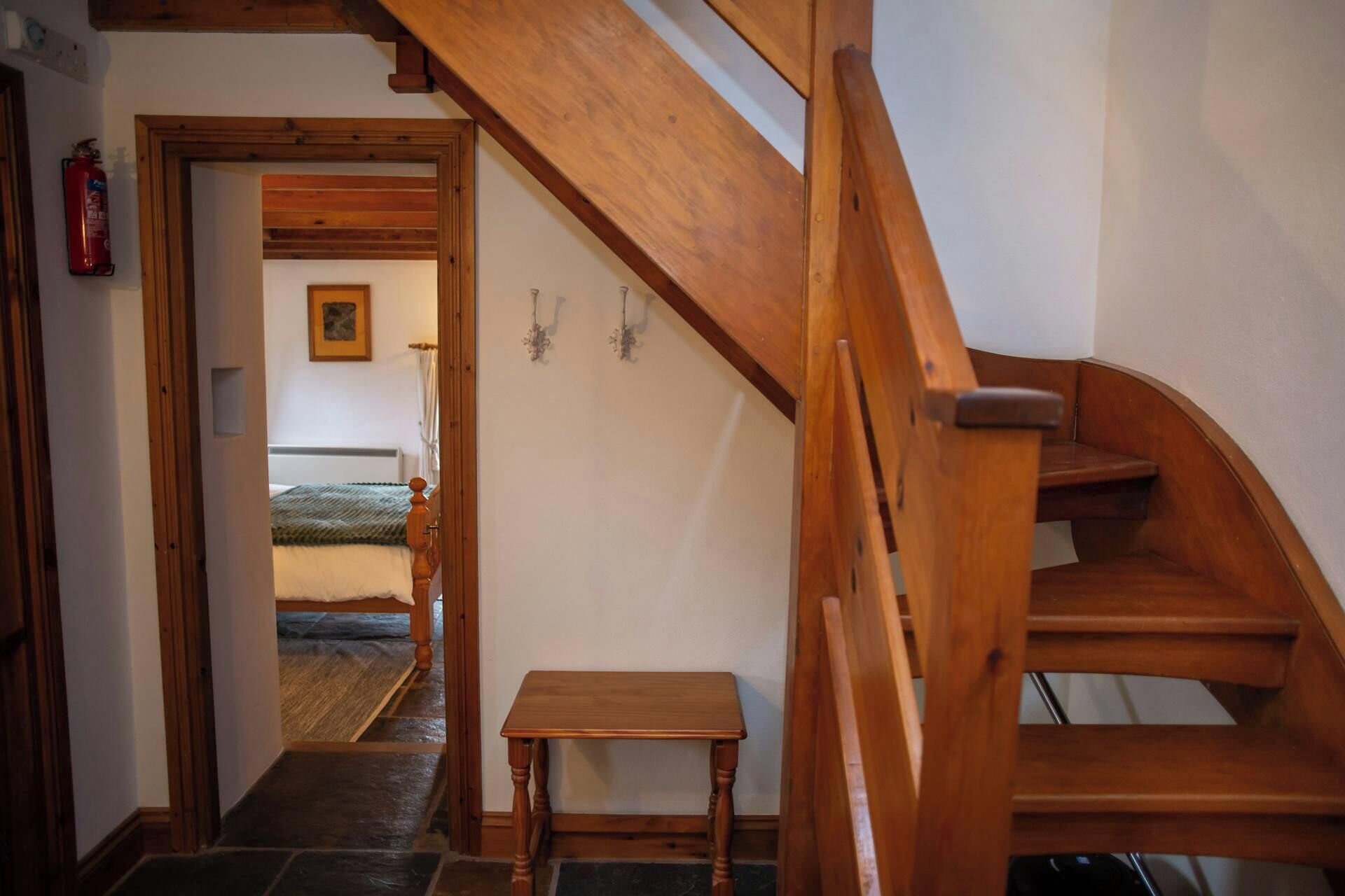 Stairs leading from the ground floor bedrooms to the living accommodation on the first floor