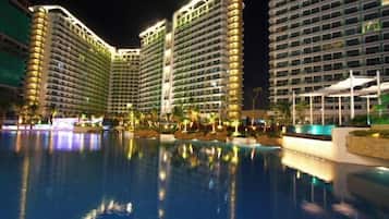 Outdoor pool, open 7:00 AM to 7:00 PM, pool umbrellas, sun loungers