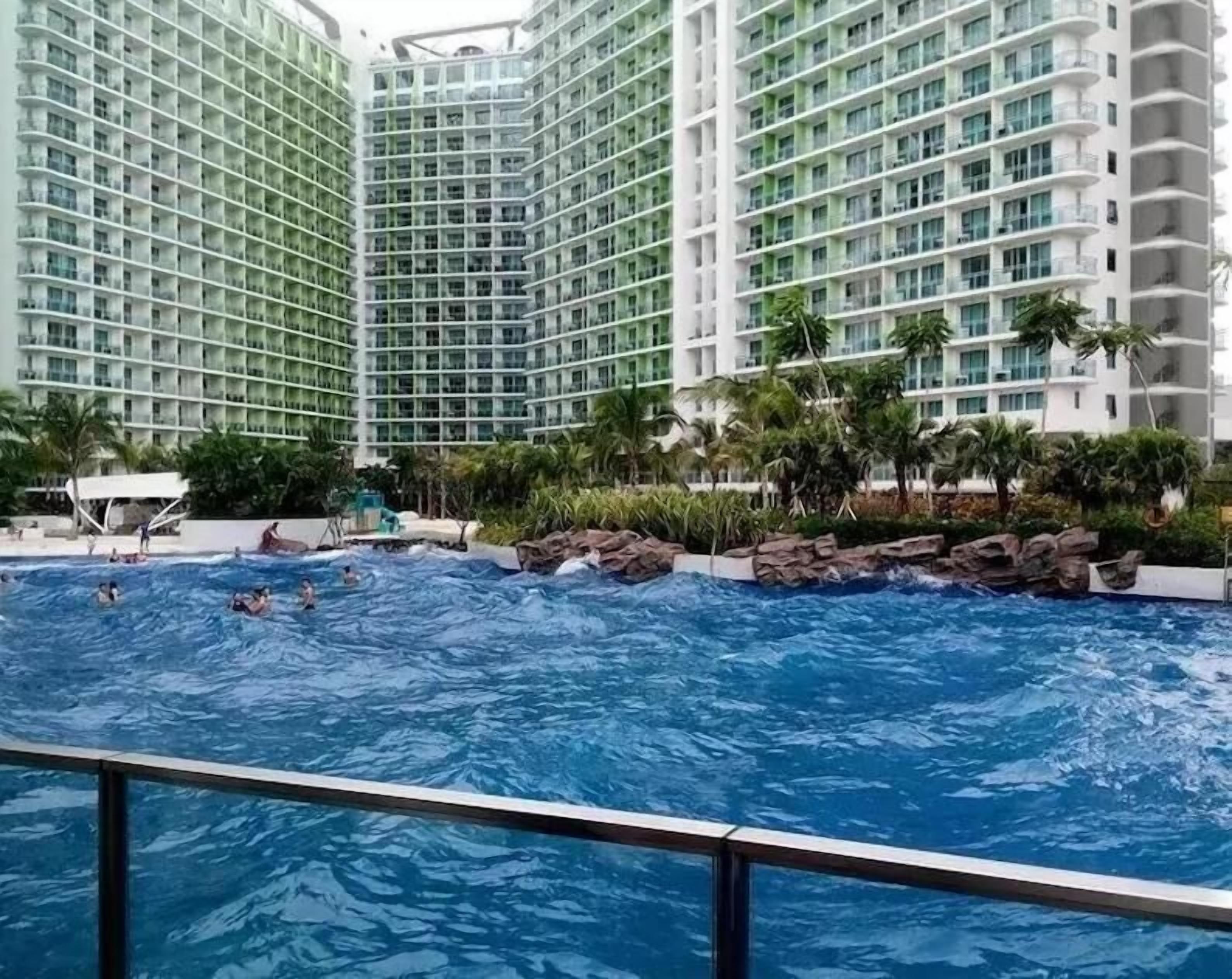 Outdoor pool, open 7:00 AM to 7:00 PM, pool umbrellas, sun loungers