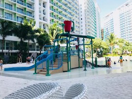 Private beach, white sand, sun loungers, beach umbrellas