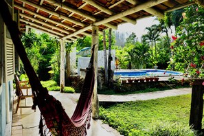 Comfort House, Pool View | Balcony view - Pousada Vila Cizinho (Itaúnas)