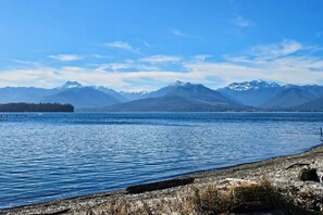 On the beach - Large waterfront beach house with hot tub, game room, & private beach access (Seabeck)