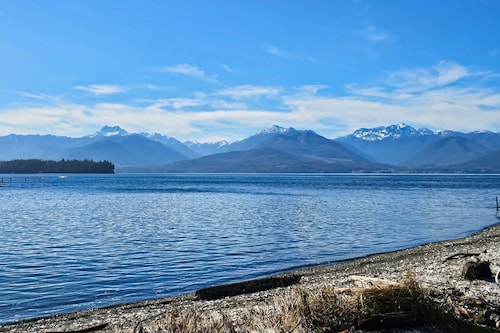 Large waterfront beach house with hot tub, game room, & private beach access