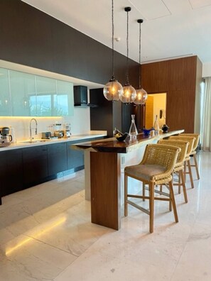 Oven, dishwasher, dining tables