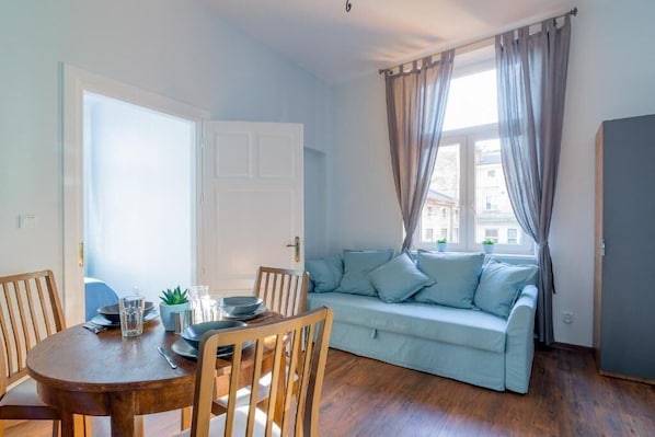Comfort Apartment | Living area | TV