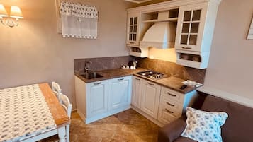 Departamento Deluxe, patio | Cocina privada