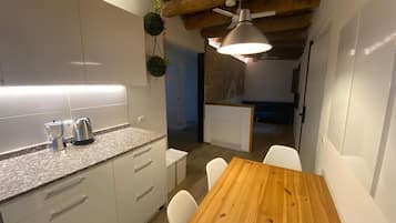 Deluxe Apartment, City View | Private kitchen | Fridge, microwave, stovetop, electric kettle