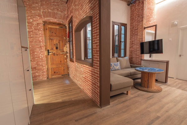 Apartamento standard | Área de estar | TV de tela plana