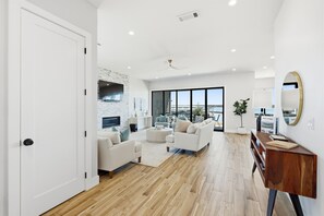 Smart TV, fireplace, foosball