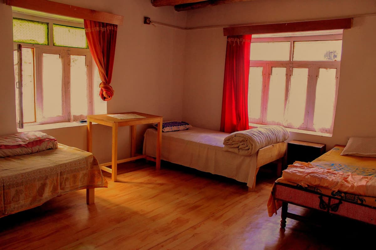 Basic Shared Dormitory, Courtyard View | Desk, laptop workspace, WiFi (free), bed sheets