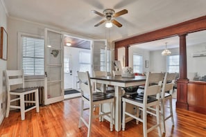 Enjoy meals in this cozy dining area with a central table and six chairs.