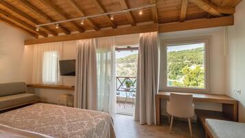 Deluxe Suite, Harbor View | In-room safe, desk, laptop workspace, blackout drapes