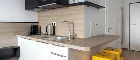 Fridge, microwave, stovetop, coffee/tea maker