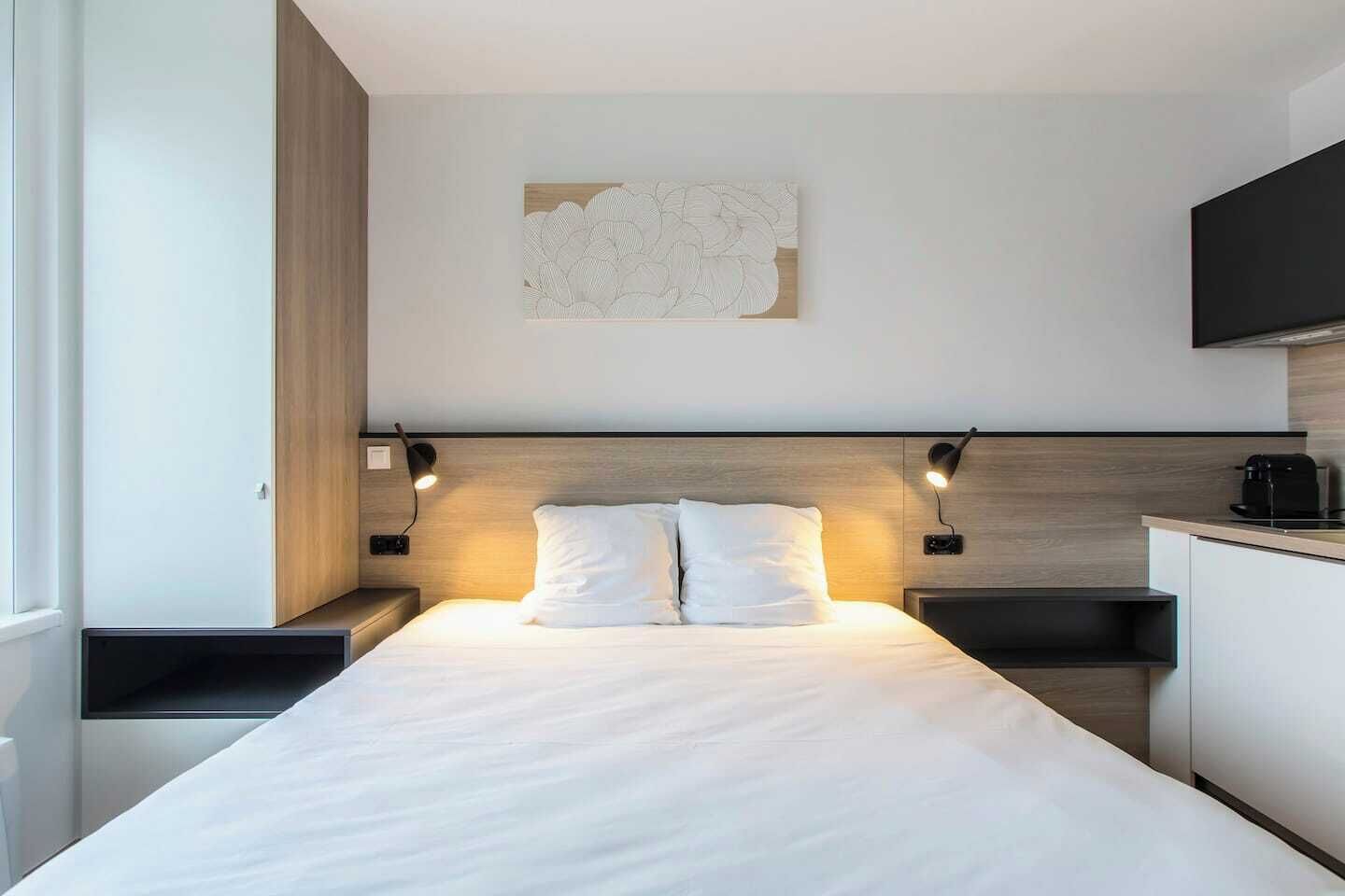 1 habitación, tabla de planchar con plancha, cuna de viaje y wifi 