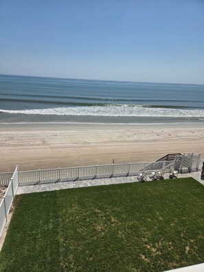 On the beach, sun-loungers, beach towels