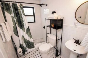 Hair dryer, towels, soap, toilet paper