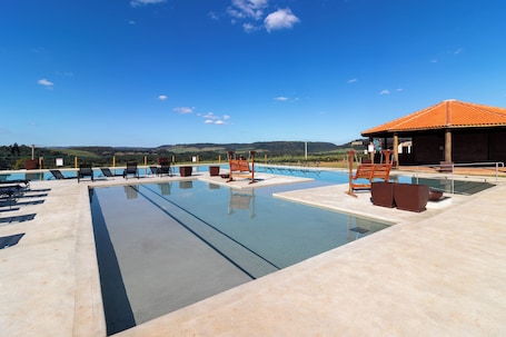 Outdoor pool, open 9:00 AM to 6:00 PM, pool umbrellas, sun loungers