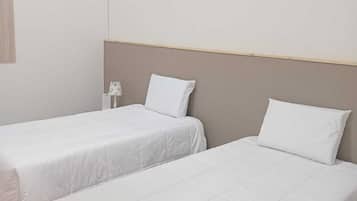 Habitación con 2 camas individuales | Ropa de cama de alta calidad, wifi gratis y ropa de cama